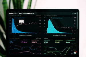 Data scientists optimizing digital marketing strategies with graphs and charts focusing on data science